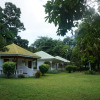 Отель Bamboo Chalets Отель Bamboo Chalets в Ла-Диге