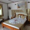 Отель Rising Sun Guest House Отель Rising Sun Guest House в Ла-Диге