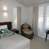 Отель Seabreeze Resort Samoa Отель Seabreeze Resort Samoa в Уполу