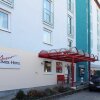 Отель Halbersbacher Airport Hotel Frankfurt Отель Halbersbacher Airport Hotel Frankfurt в Мёрфельден-Вальдорфе