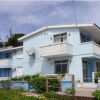 Отель Nautilus Beach Apartments Отель Nautilus Beach Apartments в Заливе Карлайл