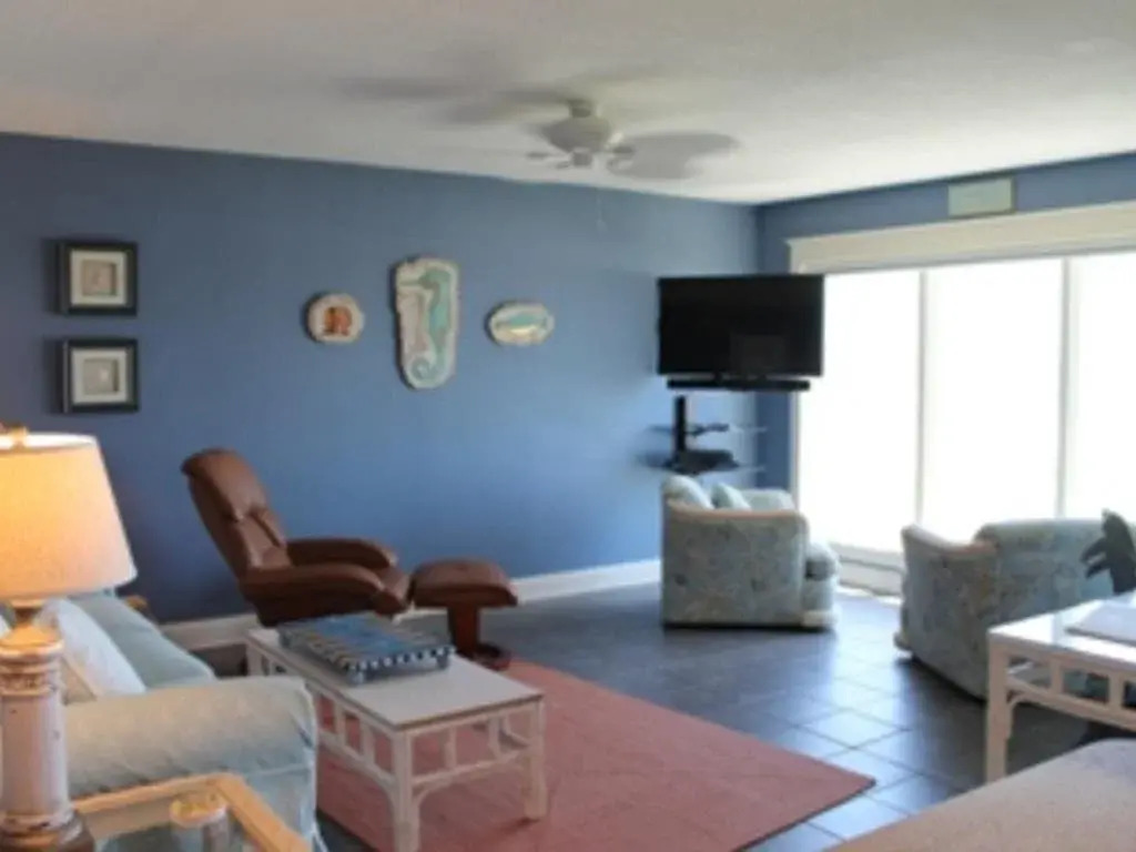 Coastline Condo with private Balcony to Enjoy Views of the Atlantic Ocean by RedAwning