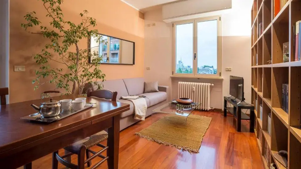 ALTIDO Warm Family Flat for 6 with Terrace in Milan