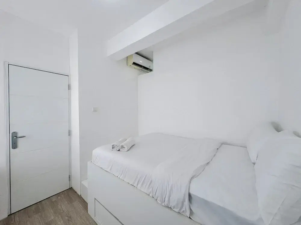 Compact and Restful 2BR at Menara Rungkut Apartment