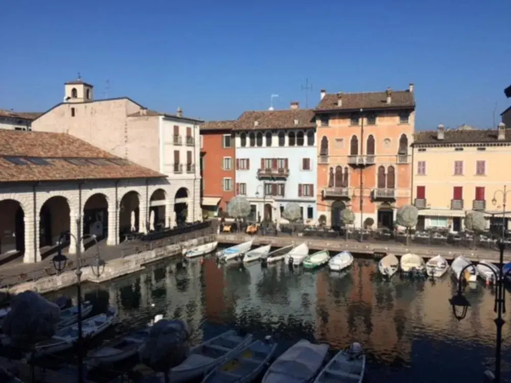 Smiling in Desenzano Lake View DesenzanoLoft Official Partner Homes & Villas by Marriott Bonvoy