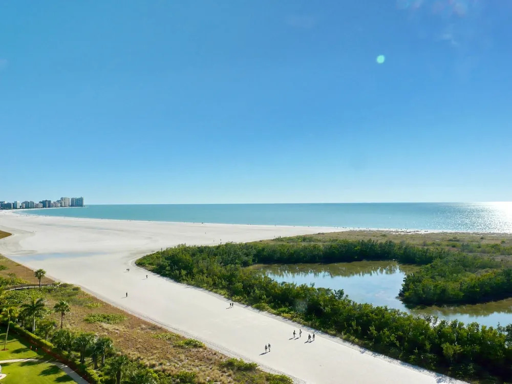 Alluring Beachfront Condo With Pool and Ocean Views
