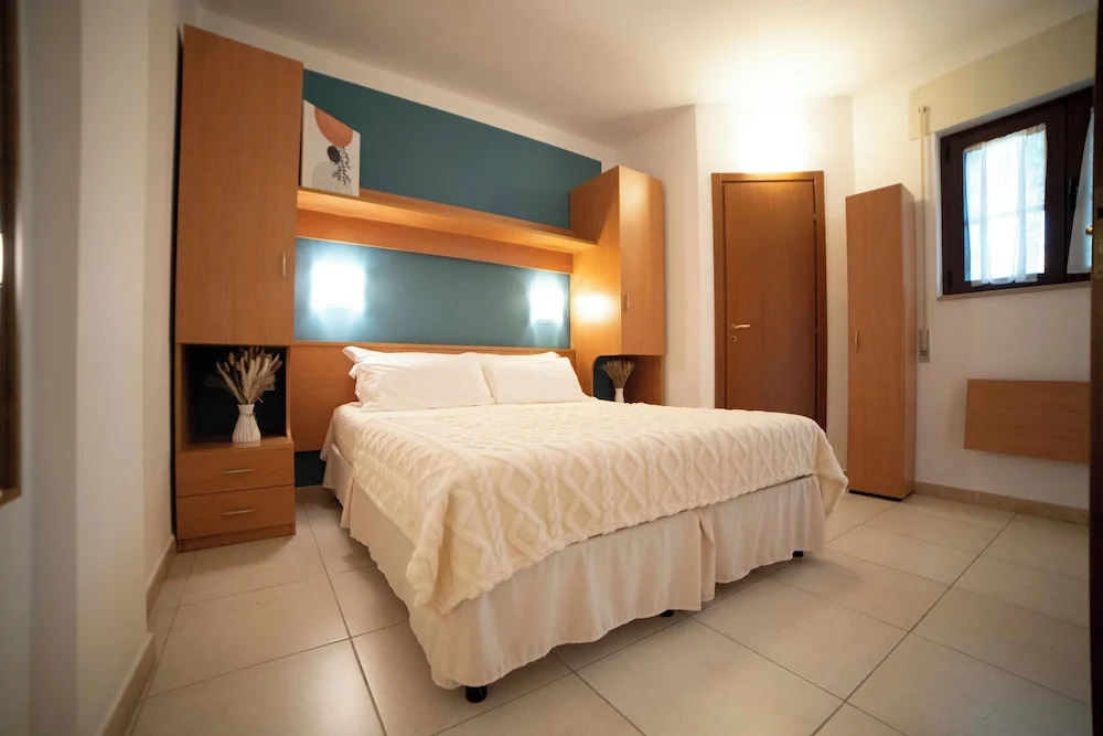 Ferienwohnung ulivo mit Pool und Privatstrand