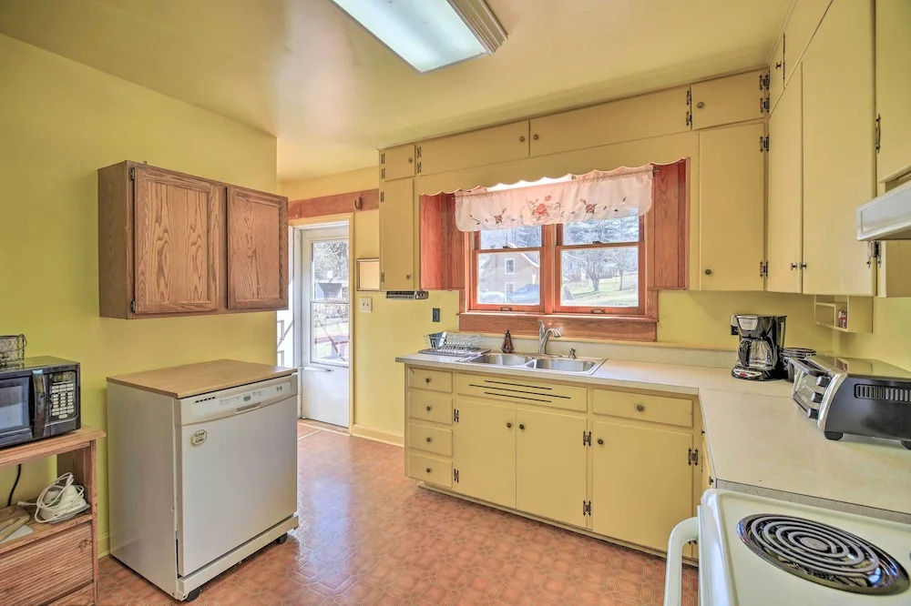 Quaint Creekside Home w/ Spacious Deck & Yard
