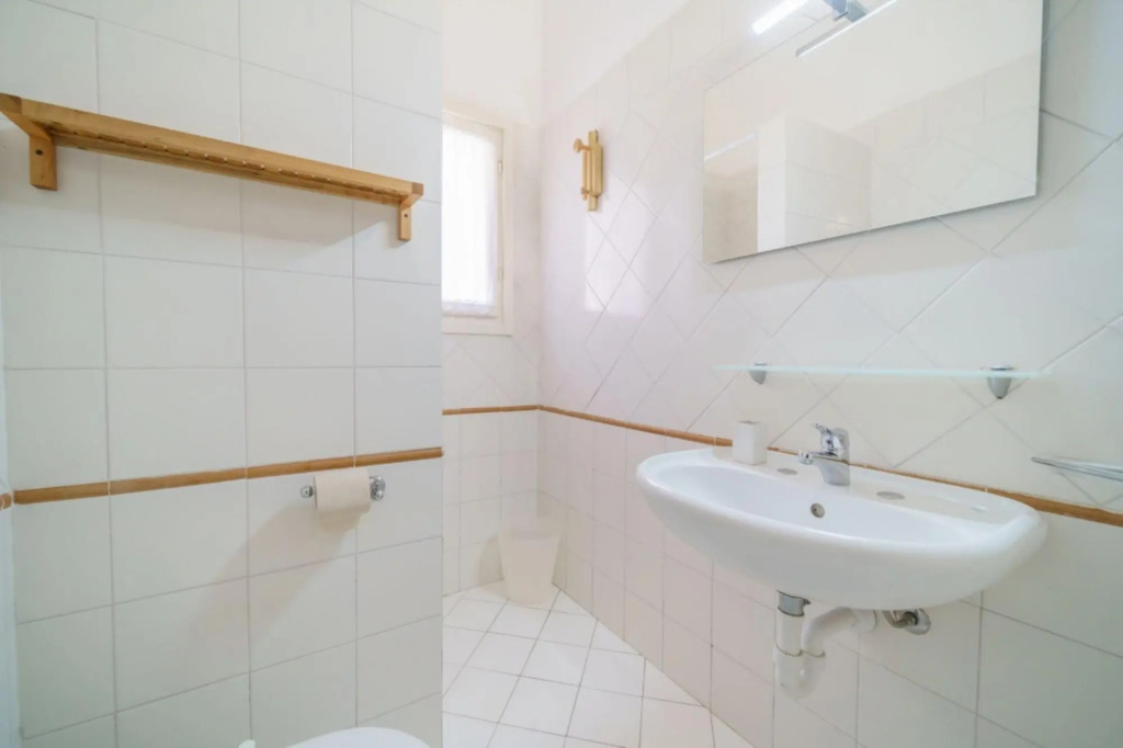 Baia Blu 1 in a small complex of colourful houses that directly overlooks the beach of Forno.-BAIA BLU N°1