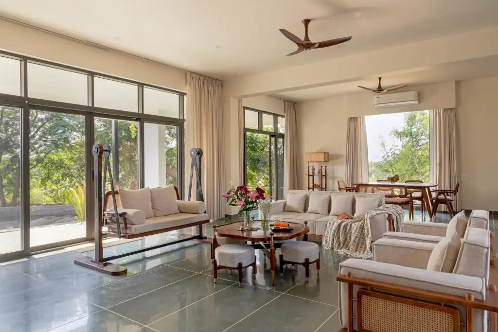 SaffronStays Camelot by the Lake - 3BR villa with glass walls, TT, projector, and gardens, Udaipur