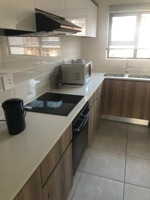 A Coastal/island experience at a Large 2 bed apartment at a Crystal Lagoon Estate