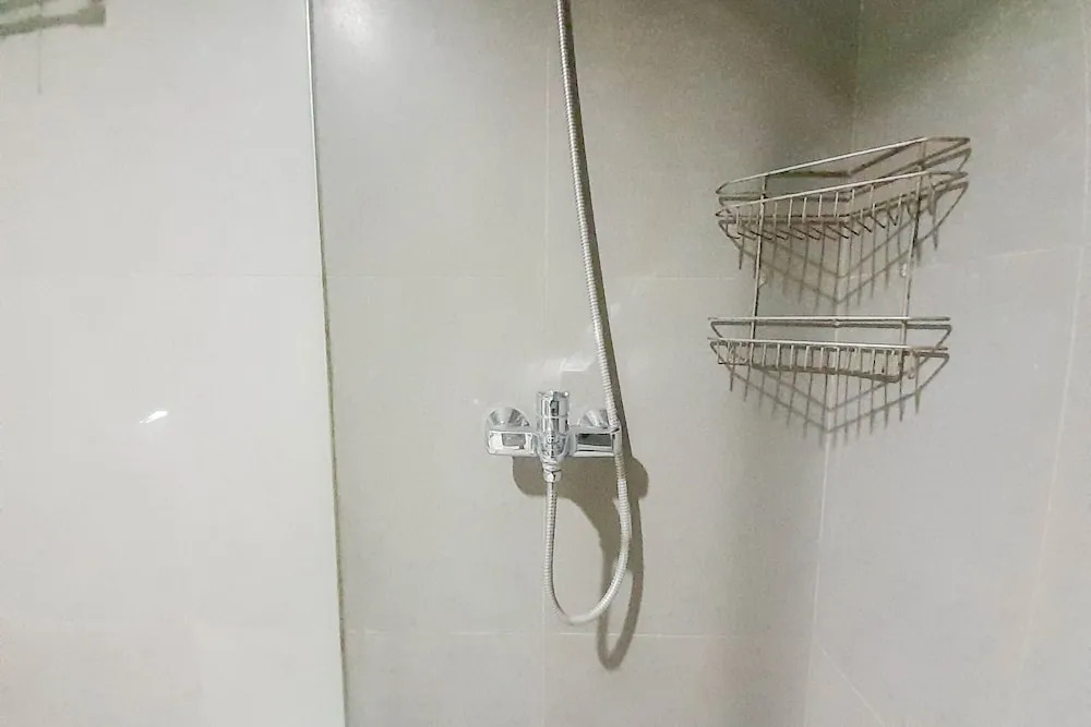 Elegant and Spacious 1BR at Patraland Amarta Apartment By Travelio