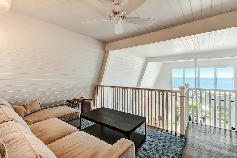 Roomy Chalet-Style Beachfront Condo with Private Beach Access by RedAwning