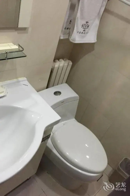 Huayang Xinxing Hotel - Beijing