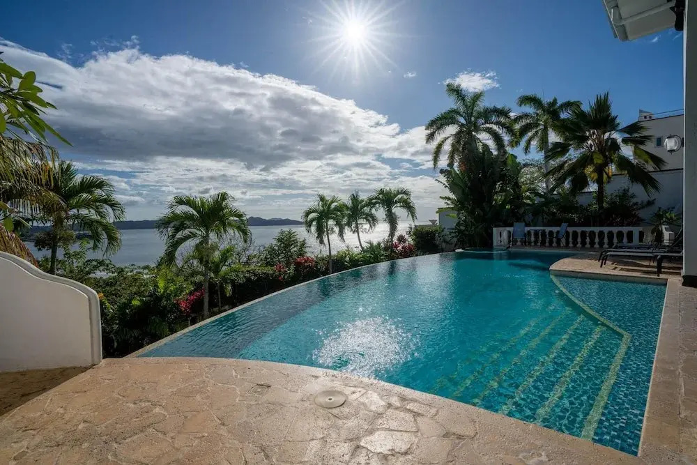 Dreamy Spanish-Style Villa with Sweeping Ocean Views, Elegant Nautical Design & Giant Infinity Pool