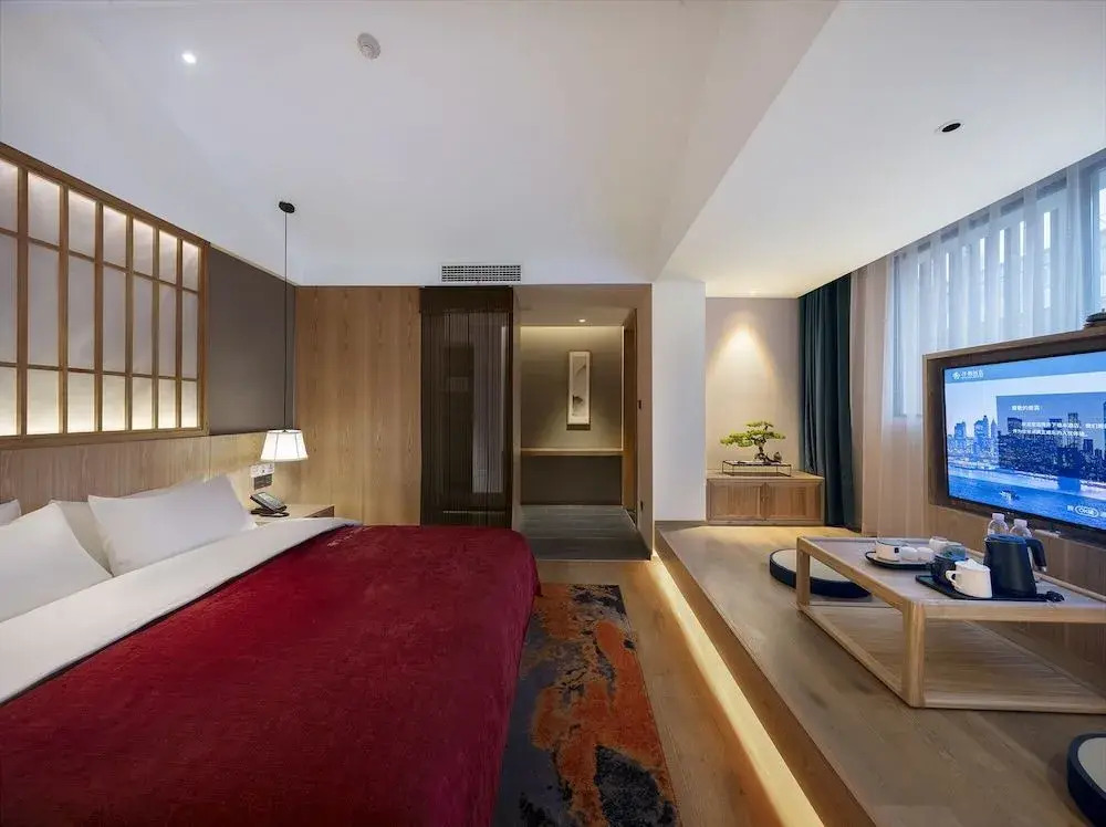 Qianna Hotel (Zhengzhou Erqi Square David City)