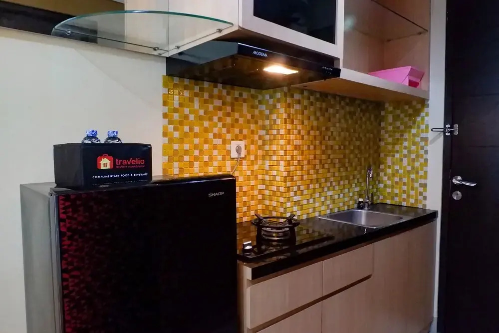 Cozy Studio With City View At Tamansari Papilio Apartment