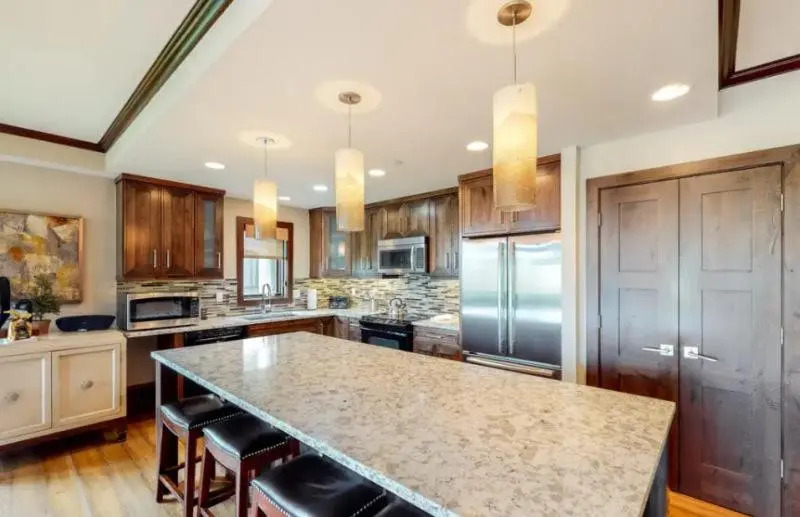 Spacious Ski in, Ski out 3 Bedroom Vacation Rental Next to the Gondola Featuring Slopeside Heated Outdoor Pool and Hot Tub