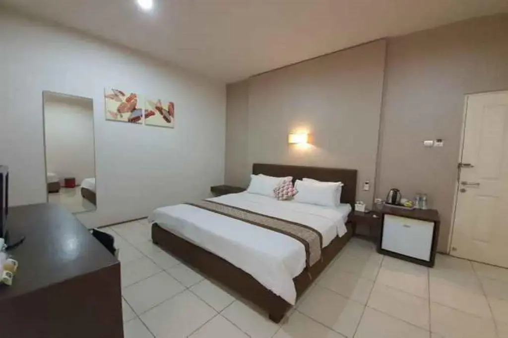 OYO 90075 Feliz Hotel