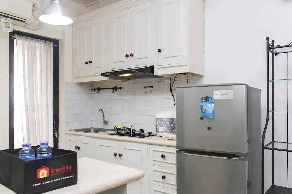 White and Nice 1BR at Bassura City Apartment