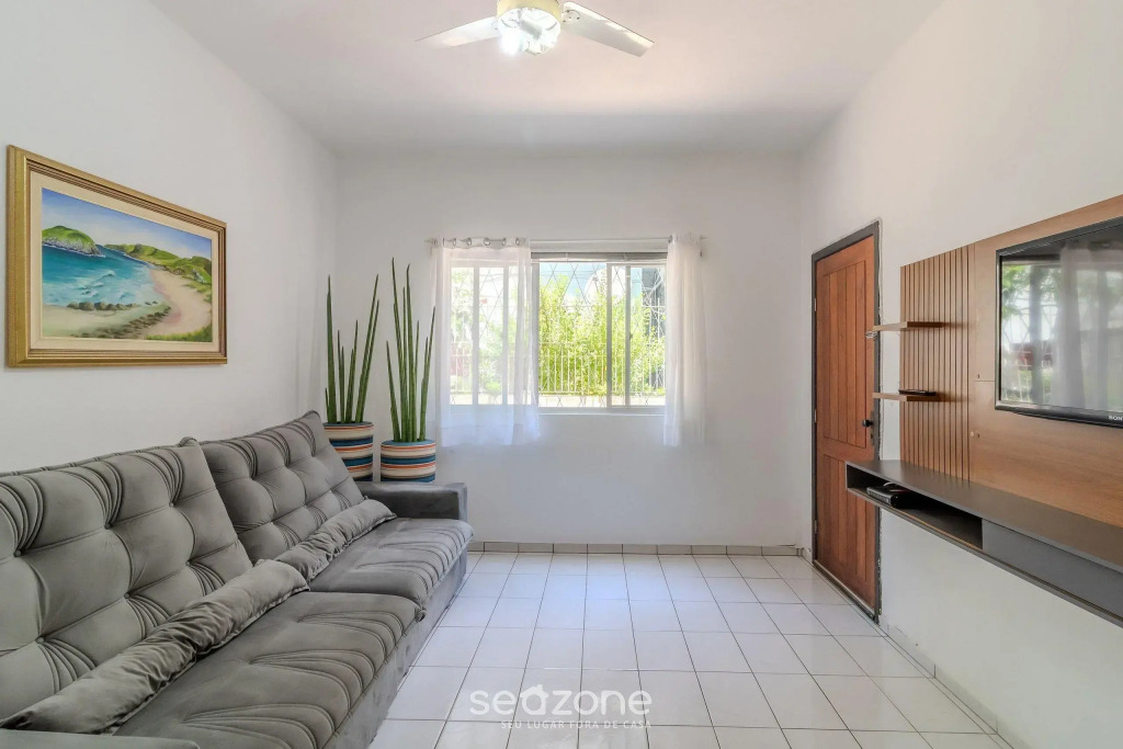 Casa 600m da Praia Central c/ garagem 3 qts NRR128