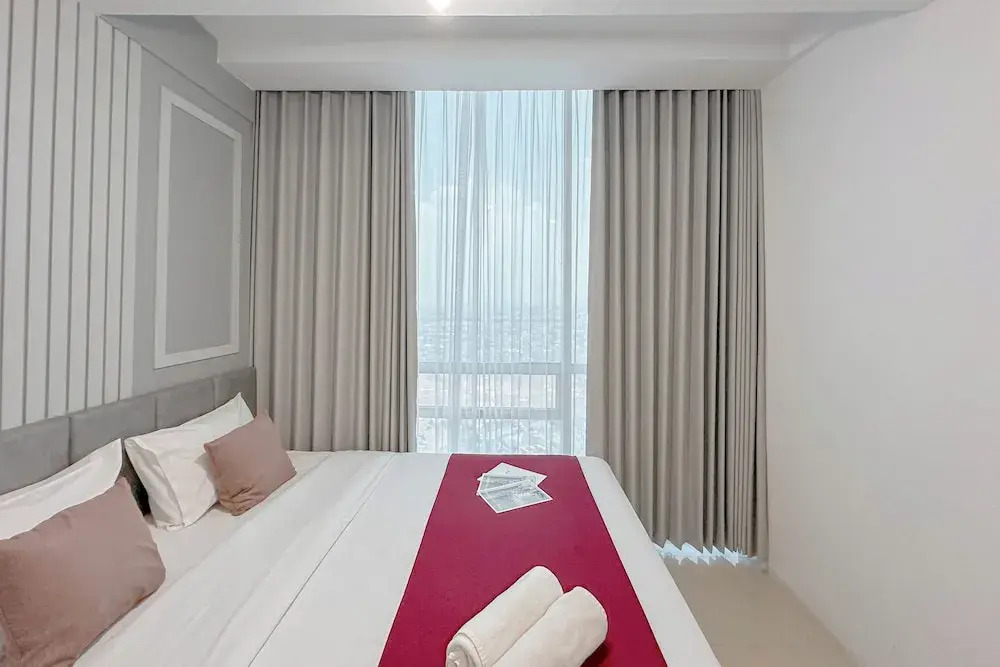 Combined Grey Toned 2Br Apartment At The City Square Surabaya