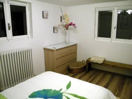 Grand appartement dans villa avec parking quartier résidentiel