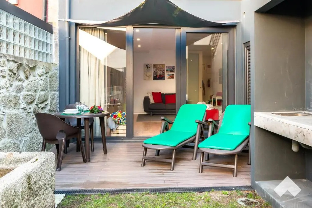 Light-Filled Apartment with Garden • Downtown