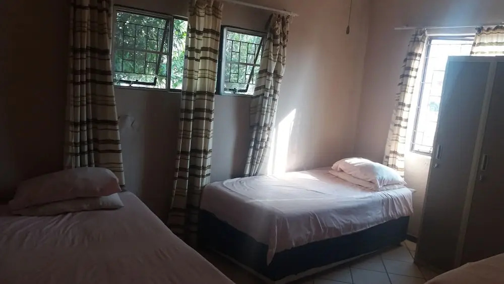 Comfy room with dstv and aircon in convenient location