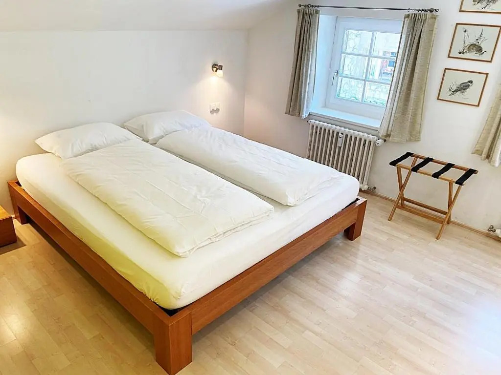 Dachwohnung im Alpenstil, 60m2 für 2P, mit Garage BM186