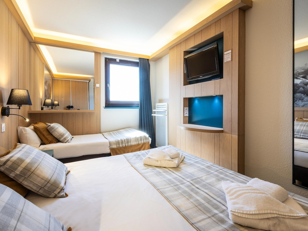 Living for Three in the Heart of Huez