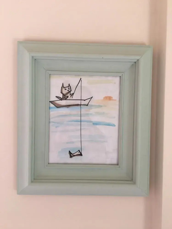 The "house of the Cat That Wanted to be a Fisherman" in Front of the sea