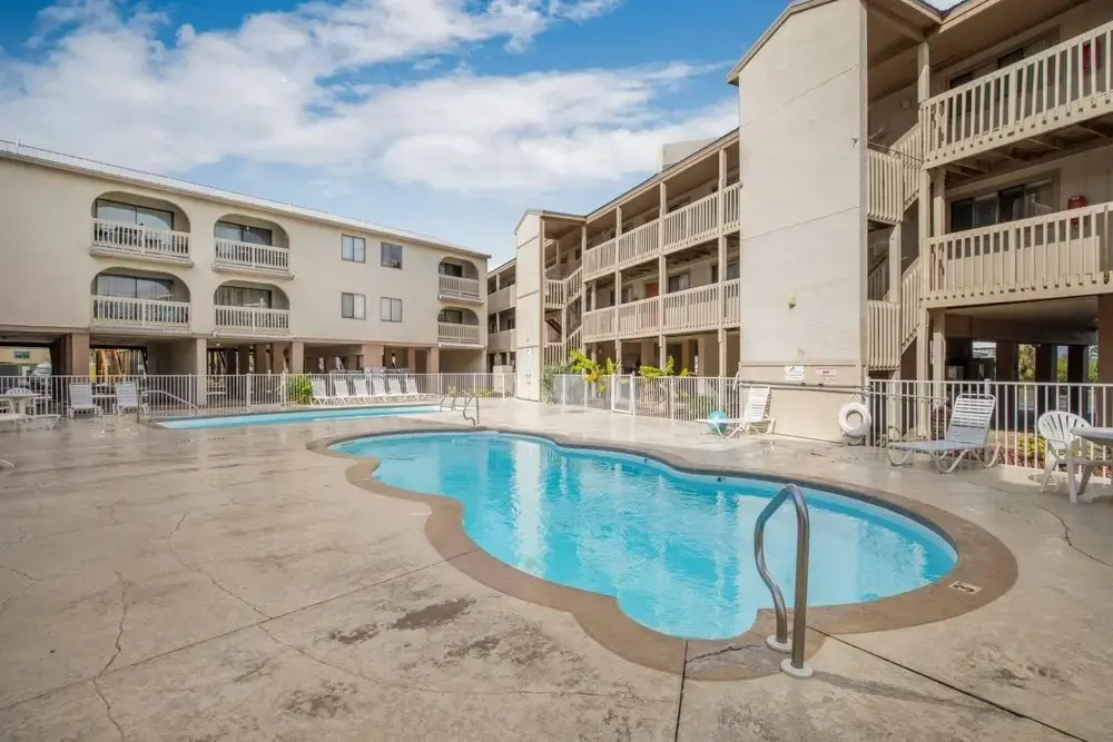 Pleasant Condo With Pool and Walk to Beach