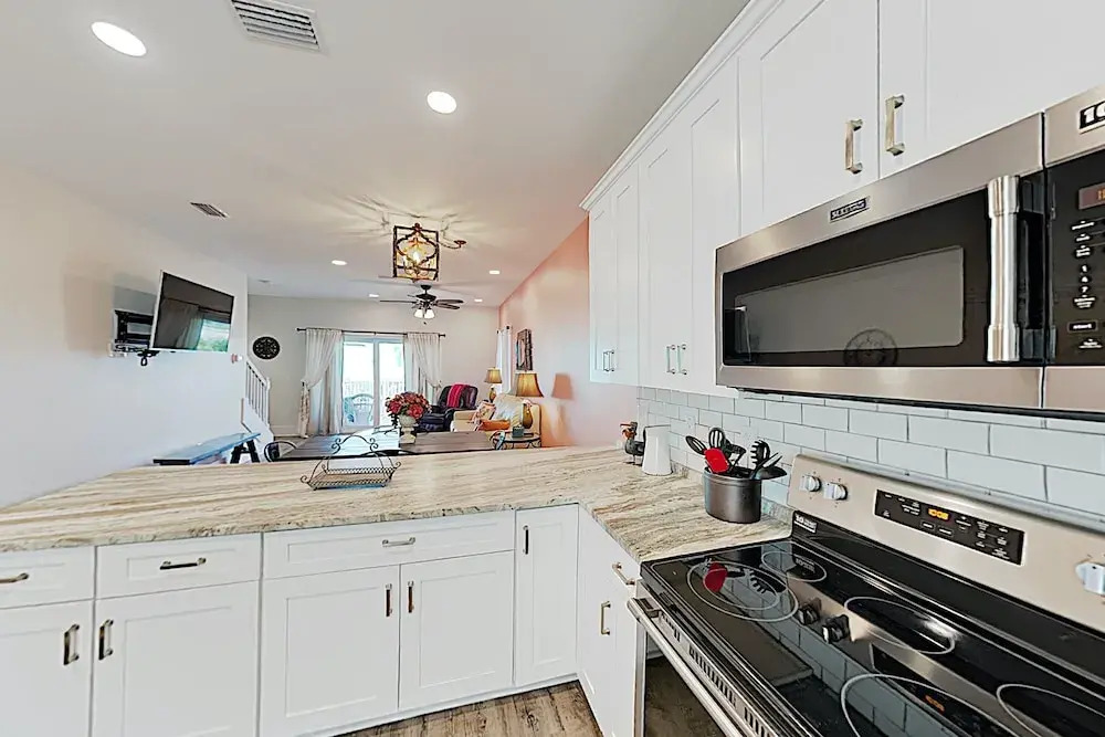 New Listing! Lagoon-front W/ Pool, Deck 2 Bedroom Townhouse