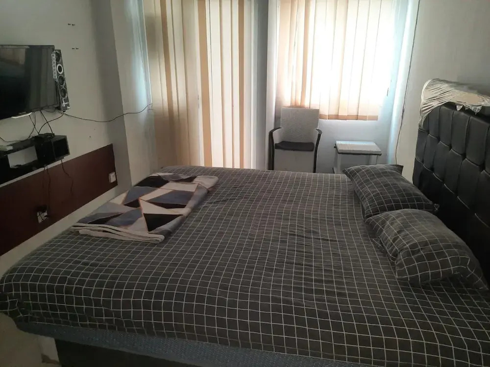 OYO Life 93139 Apartemen Grand Sentraland By Evi