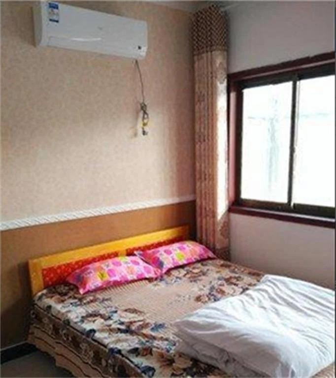 Yinan Wang Laosan Farmstay