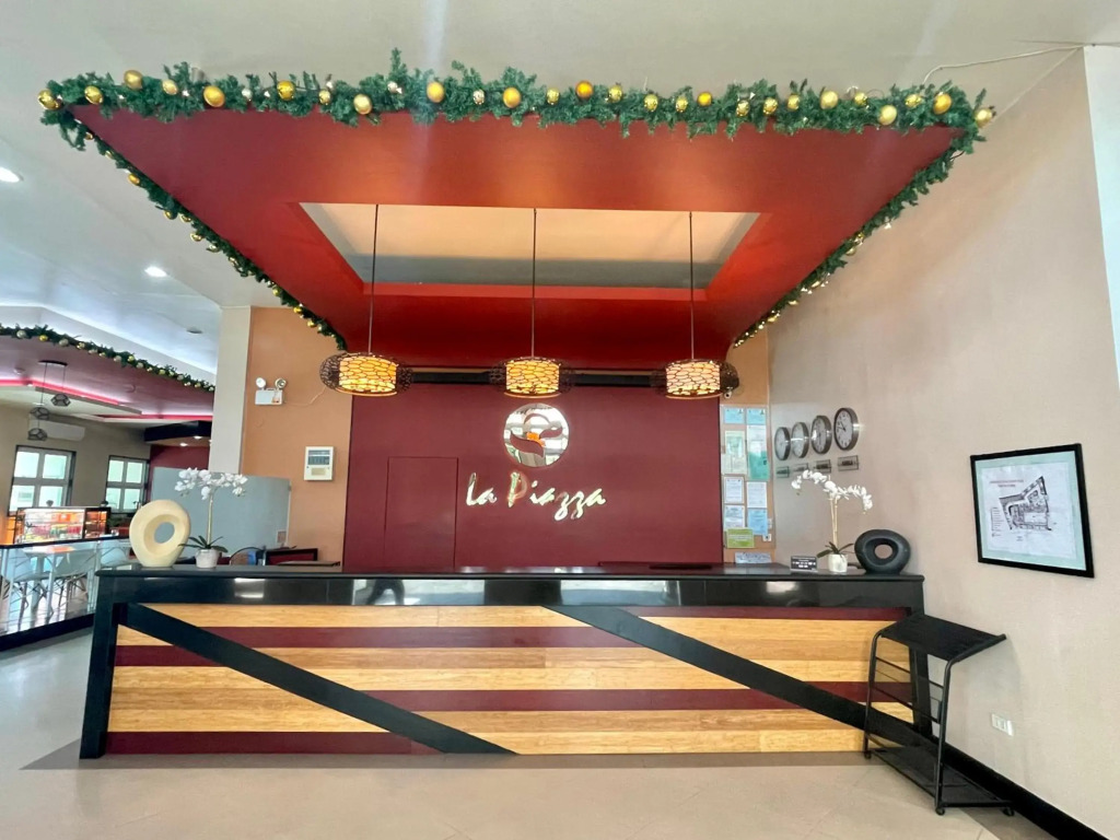 La Piazza Hotel and Convention Center Inc