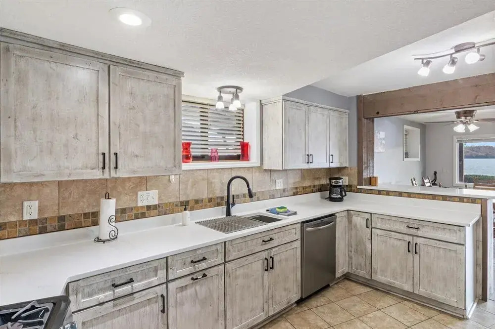 Newly Updated Interior, Sunroom w/ Hot Tub, Deck, Deep Water Dock, Boat & PWC Slips