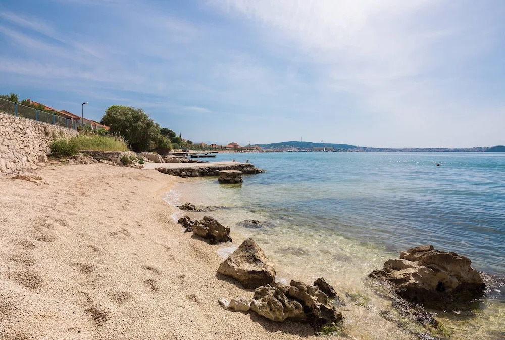 Gem of the sea luxury beach apartment with brand new heating infinity pool