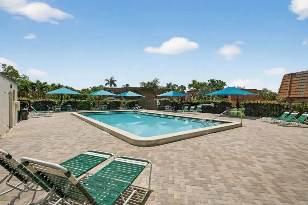 Spacious 2BR Pool Patio Escape Mins to Beach