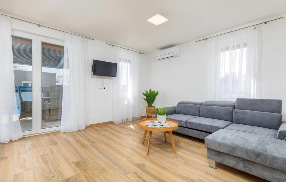 Nice Home in Peroj With Outdoor Swimming Pool, Wifi and 2 Bedrooms