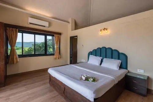 Villa Dazzle by StayVista - Unwind in a Mountain-City View Villa with a Terrace Pool