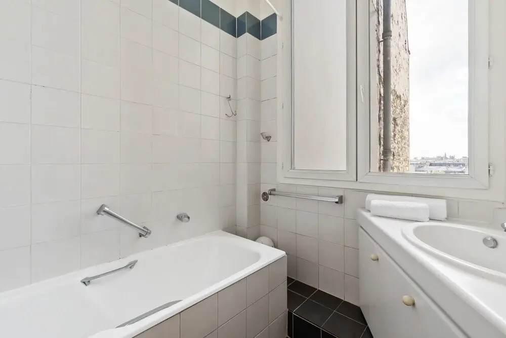 Stylish Vintage 3BR Apartment in Le Marais by GuestReady