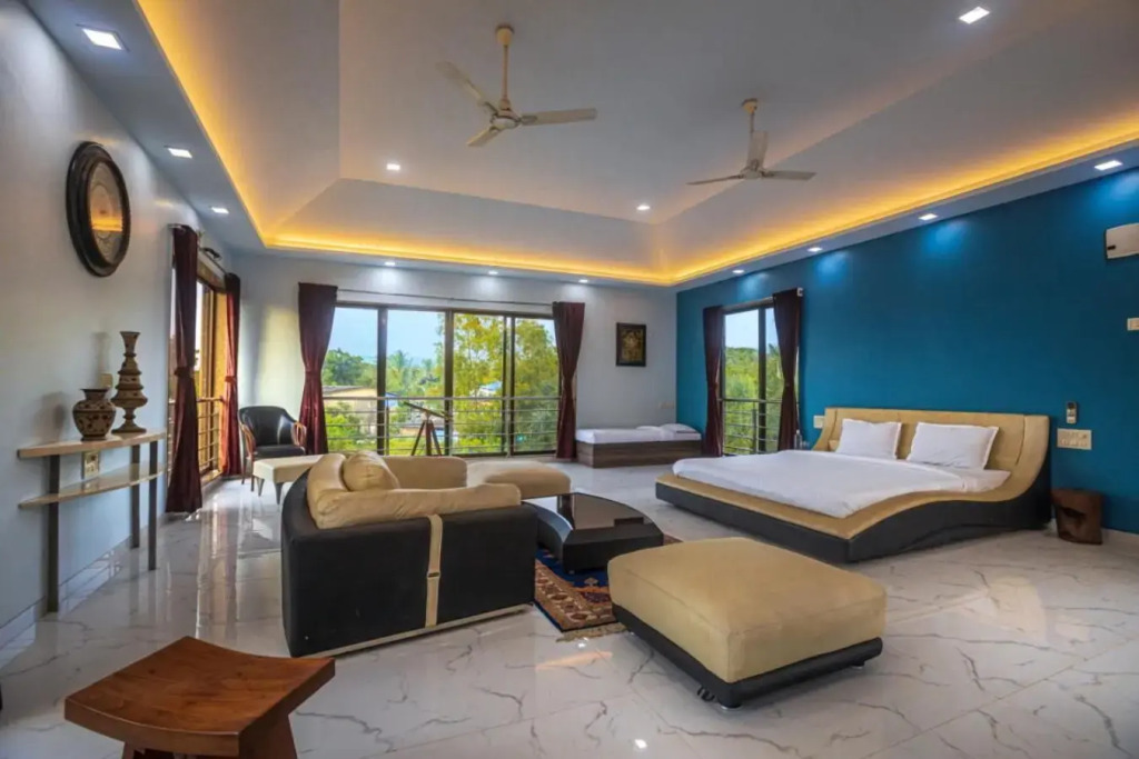 SaffronStays Aura, 4 BR Luxury Pool Villa with Game Room & Lawn