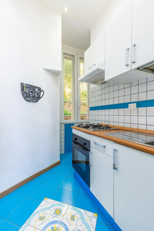 San Luigi Cozy Flat - Private Parking
