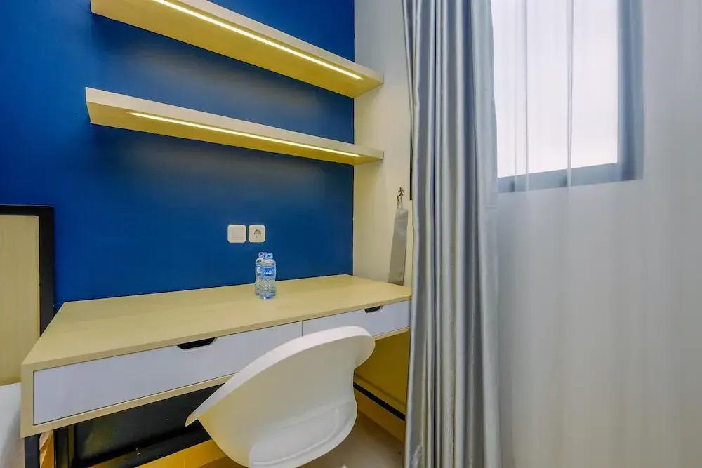 Comfy and Minimalist Studio with City View at Evenciio Margonda Apartment