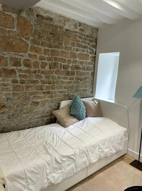 Superbe appartement avec accès patio