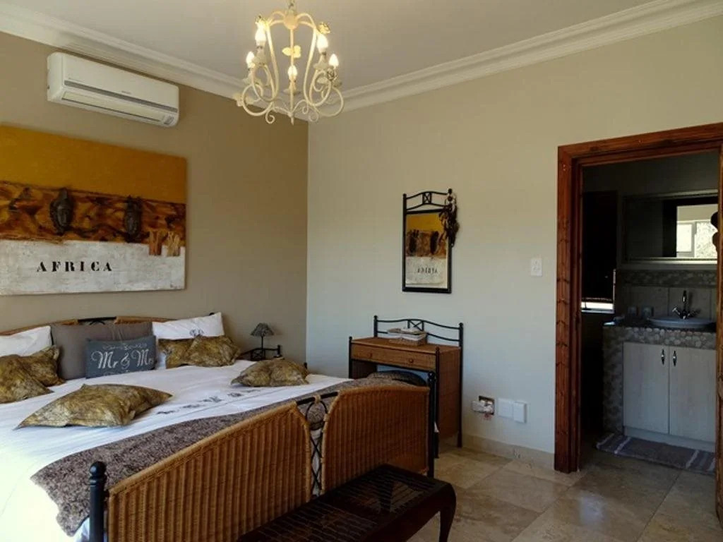 African Palm Cottage and Guesthouse
