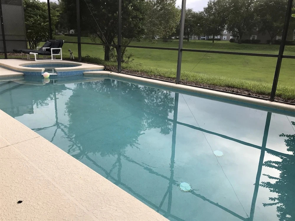 7 Bedroom Home With Private Screened Pool Spa Gameroom and 2 Master Suites by Florida Dream Homes