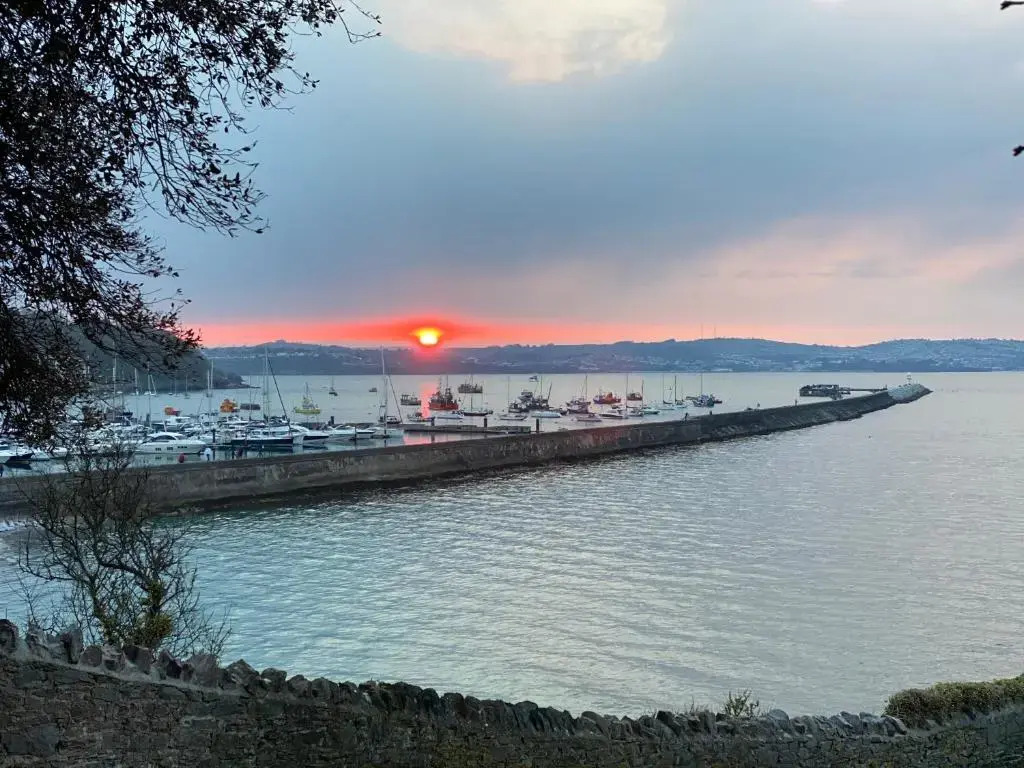 LOBSTER POT APARTMENT with stunning harbour and sea views and free parking for one car & pet friendly